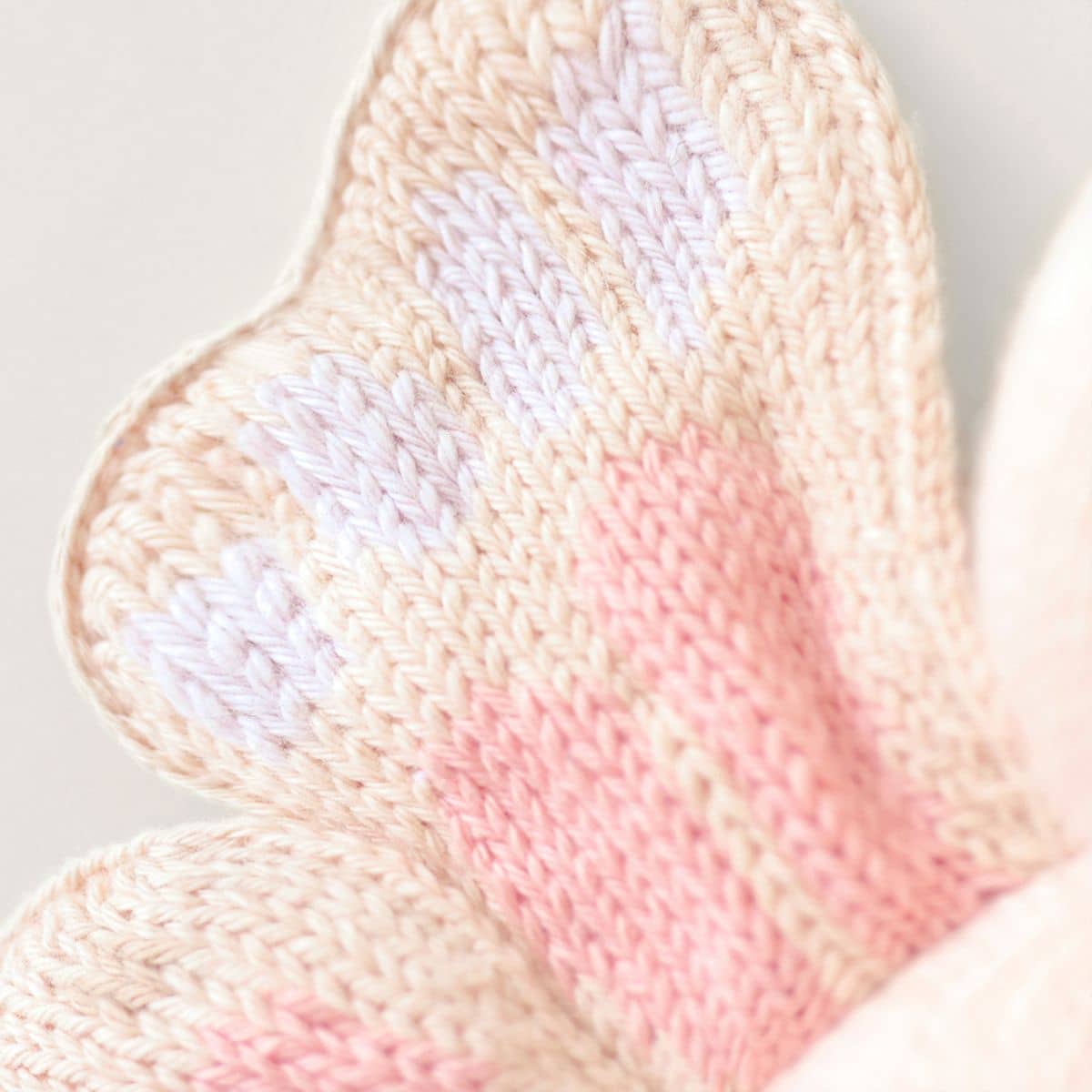 Cuddle + Kind Hand-Knit Doll - Baby Butterfly (petal pink)