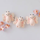 Cuddle + Kind Hand-Knit Doll - Baby Butterfly (petal pink)