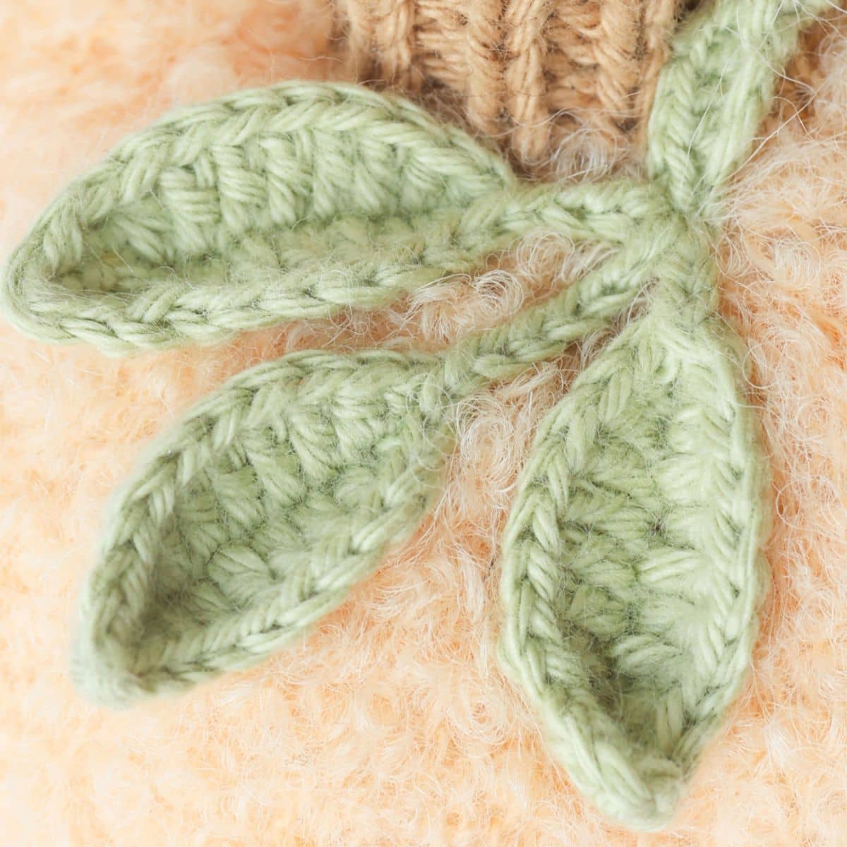 Cuddle + Kind Hand-Knit Doll - Baby Pumpkin (peach floral)