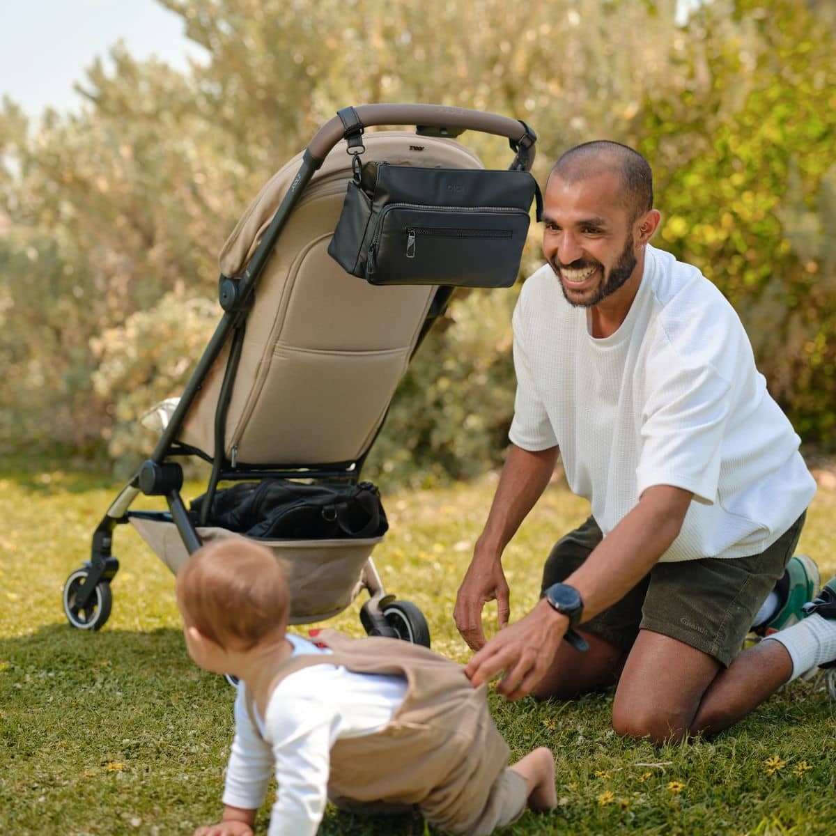 OiOi Weatherproof Multitasker Pram Caddy - Black
