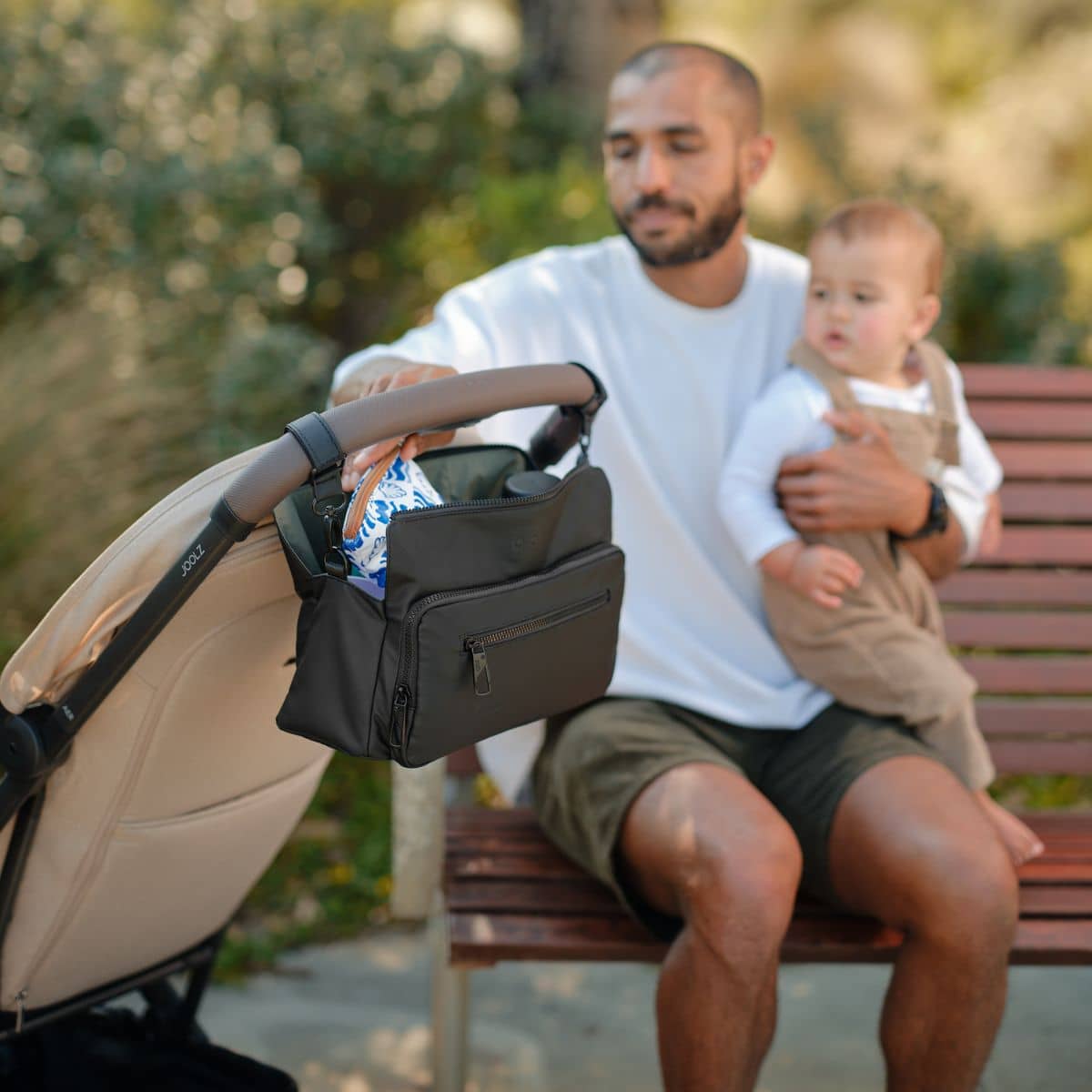 OiOi Weatherproof Multitasker Pram Caddy - Black