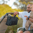 OiOi Weatherproof Multitasker Pram Caddy - Black