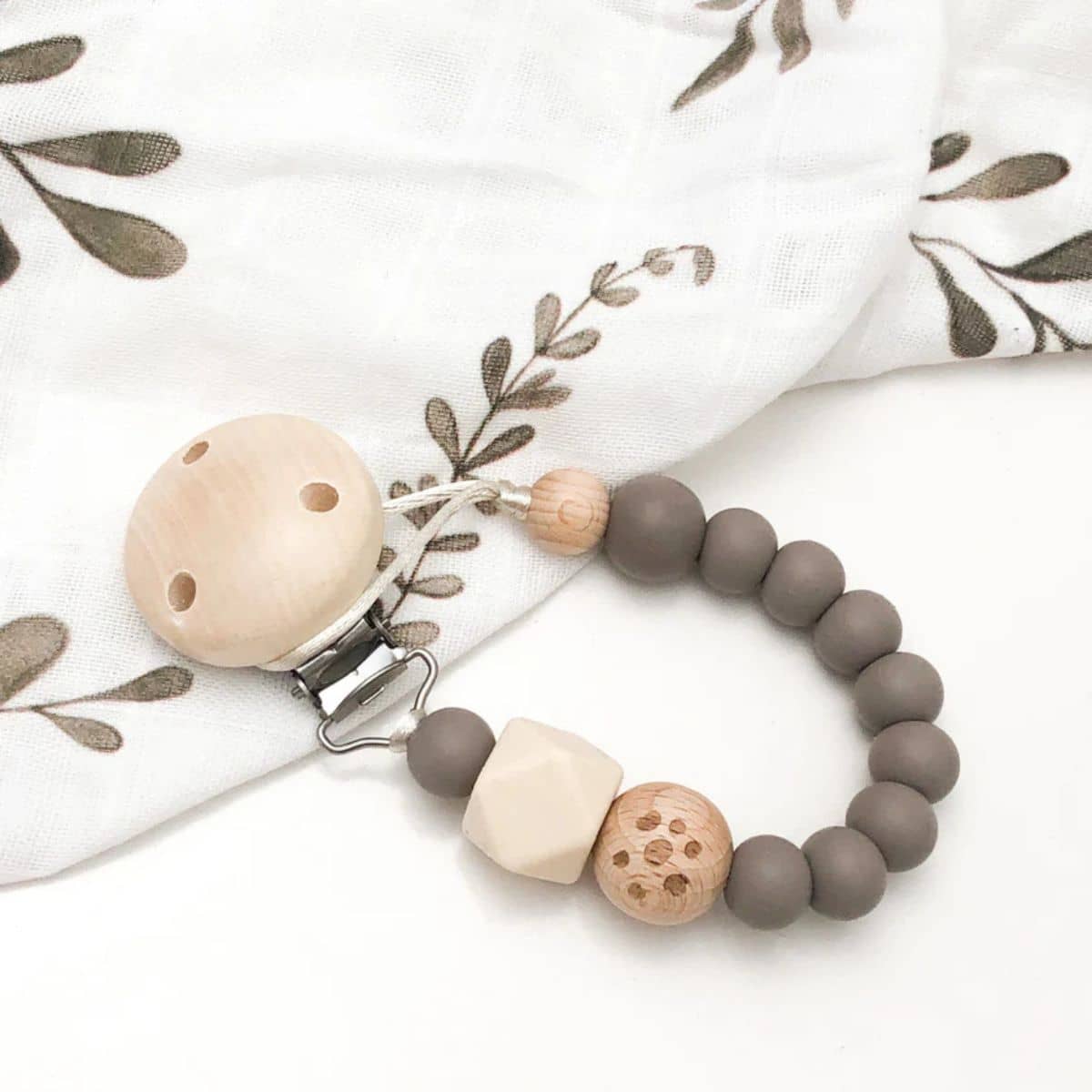 One.Chew.Three Silicone Dummy Holder Clip - Elements - Stone Pebbles