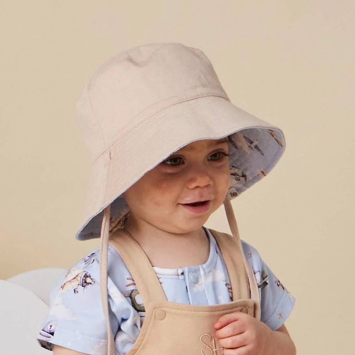 Snuggle Hunny Reversible Cotton Bucket Hat - Taking Flight