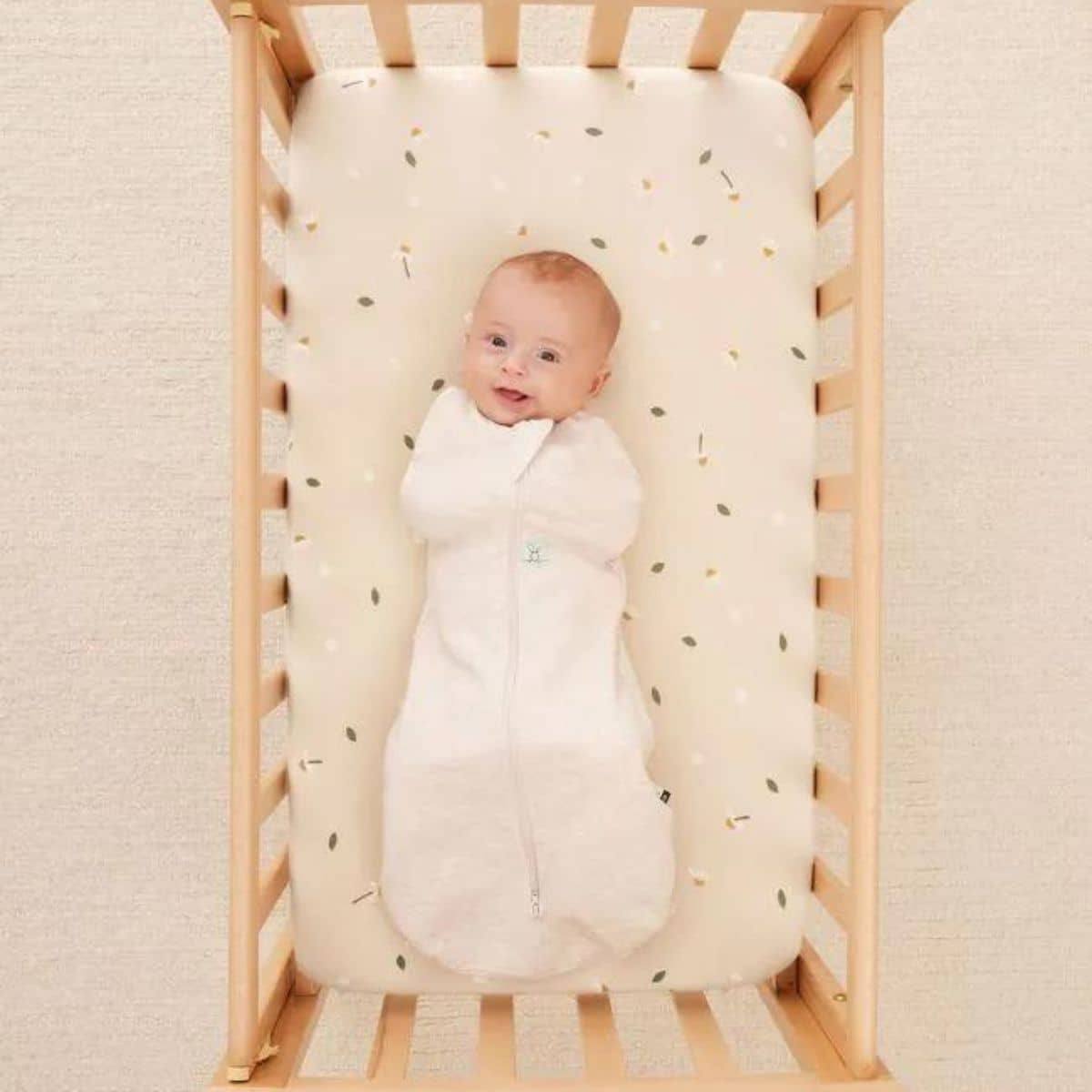 ergopouch 2-in-1 Waterproof Fitted Sheet - Bassinet - Daisy Sprinkle