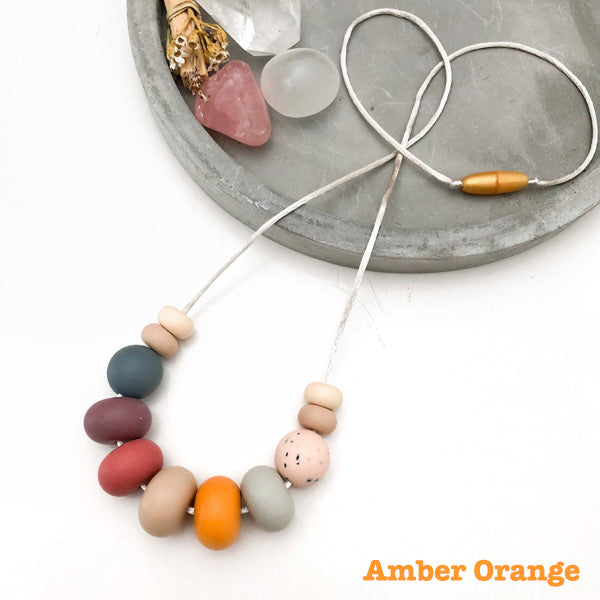 One.Chew.Three Nala Silicone Necklace - Amber Orange